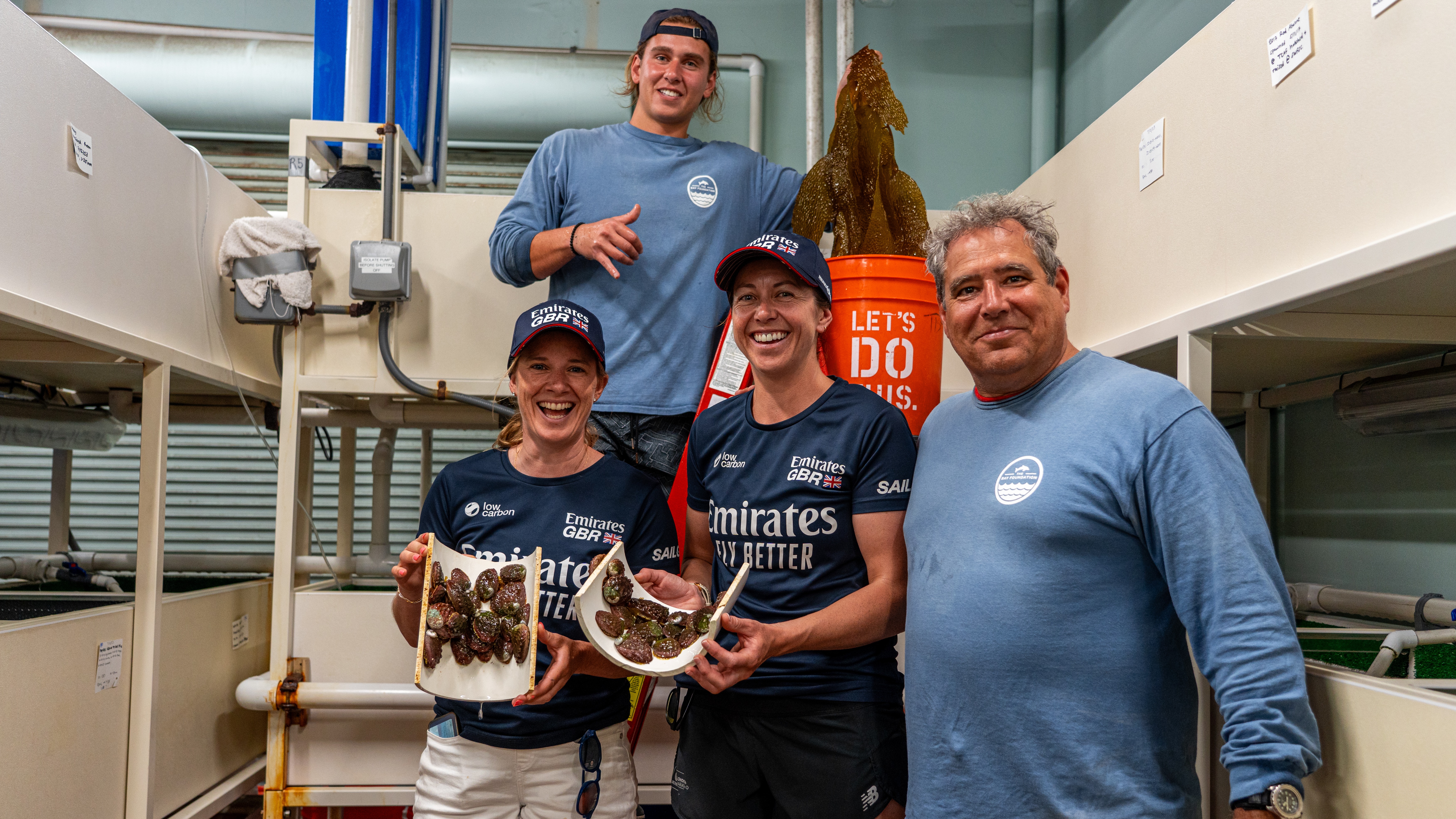 Season 4 // SailGP athletes pose with white abalone in Los Angeles