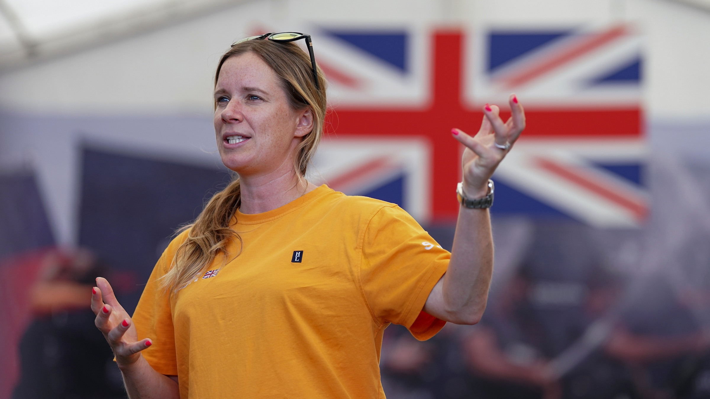 Season 3 // Great Britain Sail Grand Prix // Hannah Mills with GBR flag