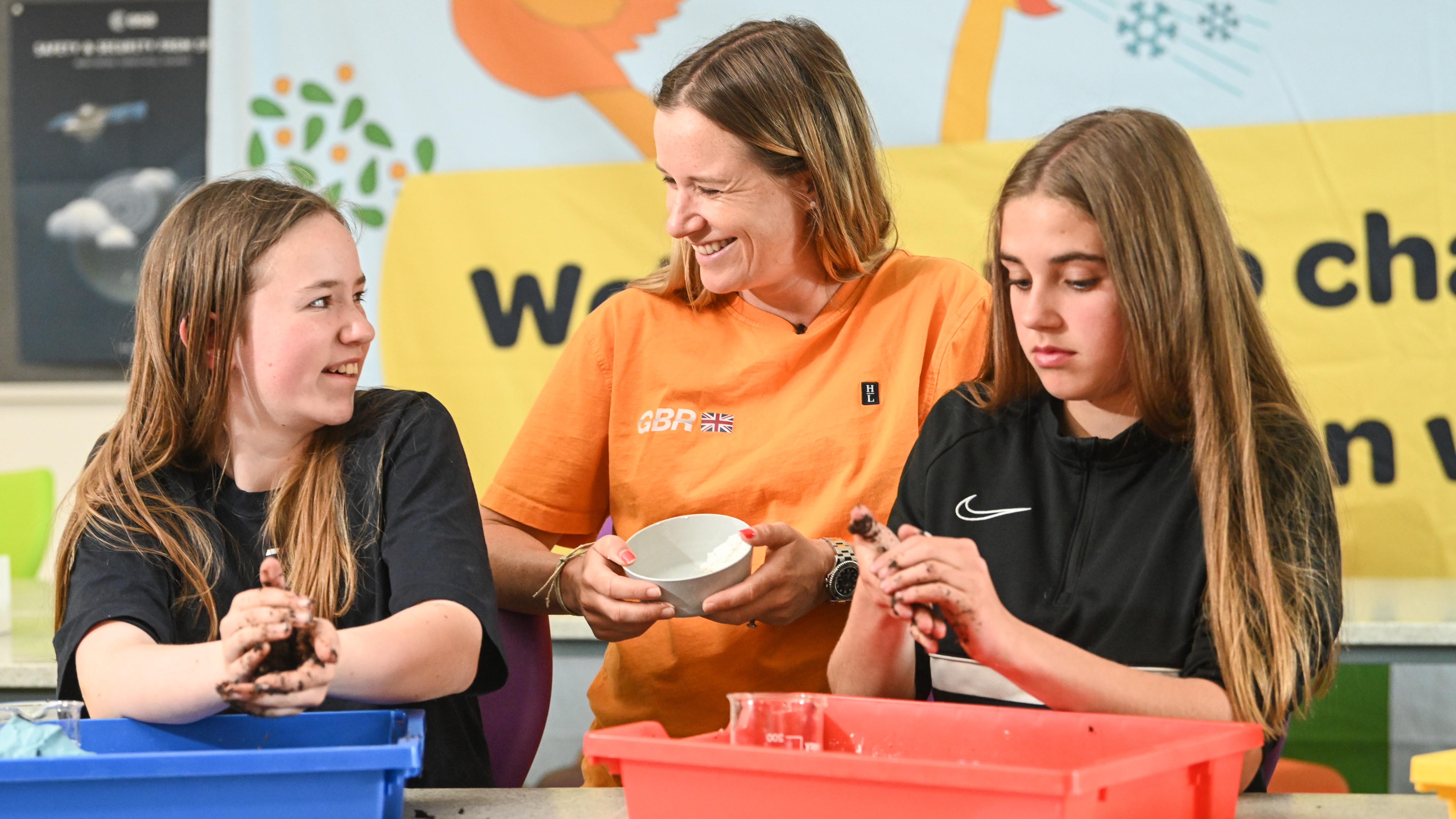 Season 3 // Great Britain Sail Grand Prix // Purpose // Hannah Mills with school kids ahead of Plymouth