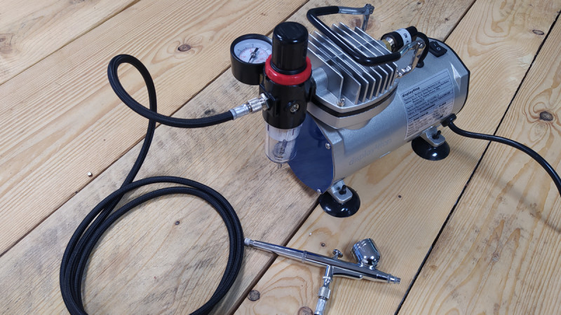 All set up with a budget airbrush; this compressor can help create a reasonable budget setup