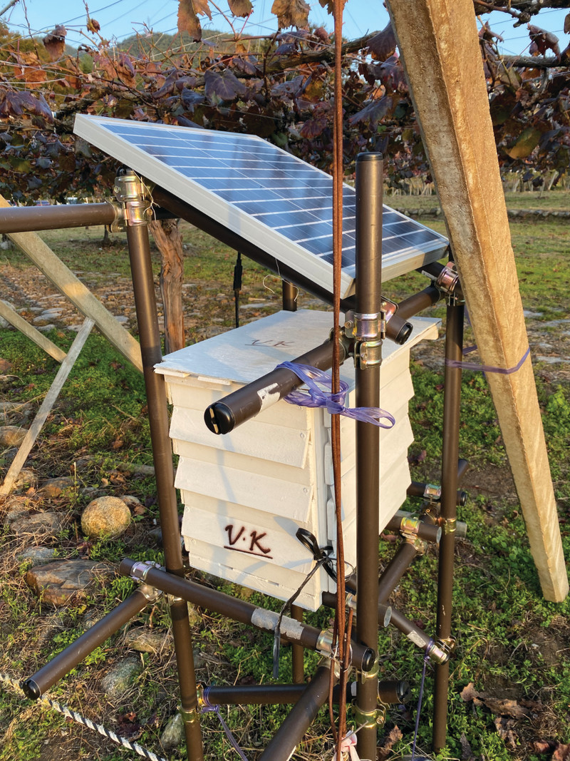 The first prototype system set out in the field. Sensors hang out of the box to obtain an accurate reading