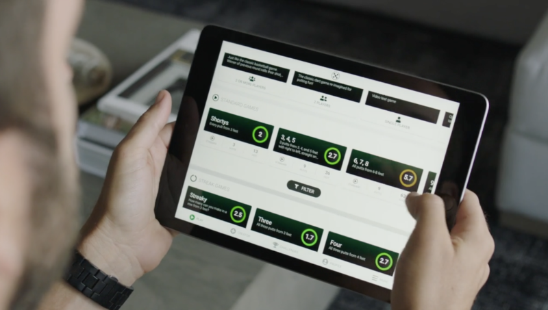 The Puttr app automatically connects the mat to the phone or tablet via Bluetooth and records statistics for each player’s putting average.