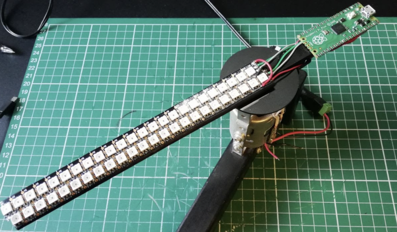 Mounted on the other end of the rotating arm, Raspberry Pi Pico controls the LEDs