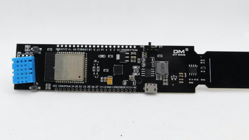 The ESP32 module and DHT11 are mounted together on the top half of the PCB