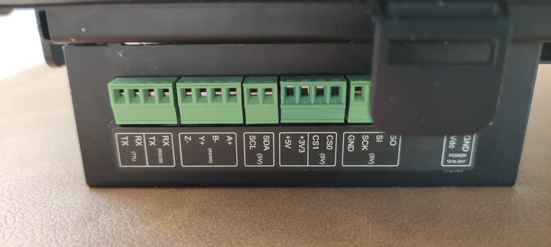 There are I/O (and power) connections – with removable screw terminal blocks – on either side of the unit