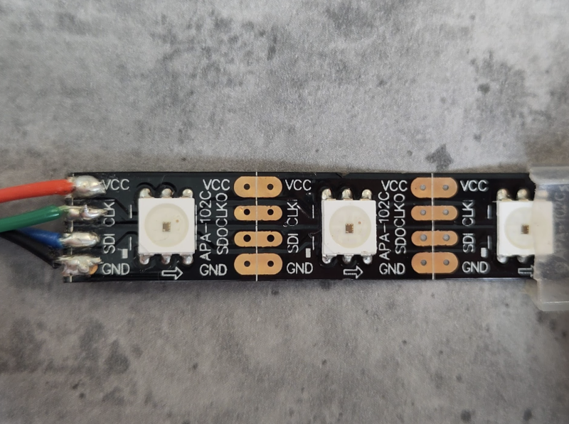 Make sure you attach wires to the right end of the LED strip (the arrow shows the direction the information travels through the strip)