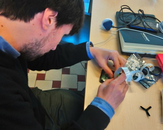 Kris Vanherle and colleague Giovanni Maccani work on the production of a sensor device which is housed inside an expensive casing made by TEKO