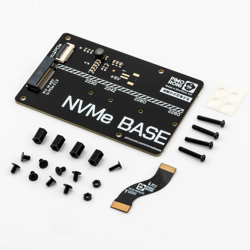 The NVMe Base comes with a standoffs kit, flat flexible PCIe cable, and four rubber feet