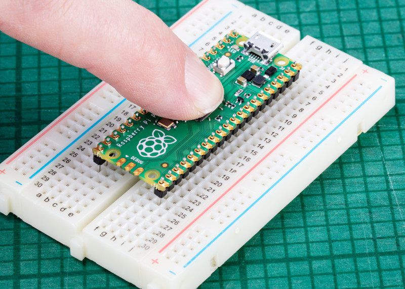 Figure 2 Alternatively, use a breadboard to hold the headers in place for soldering