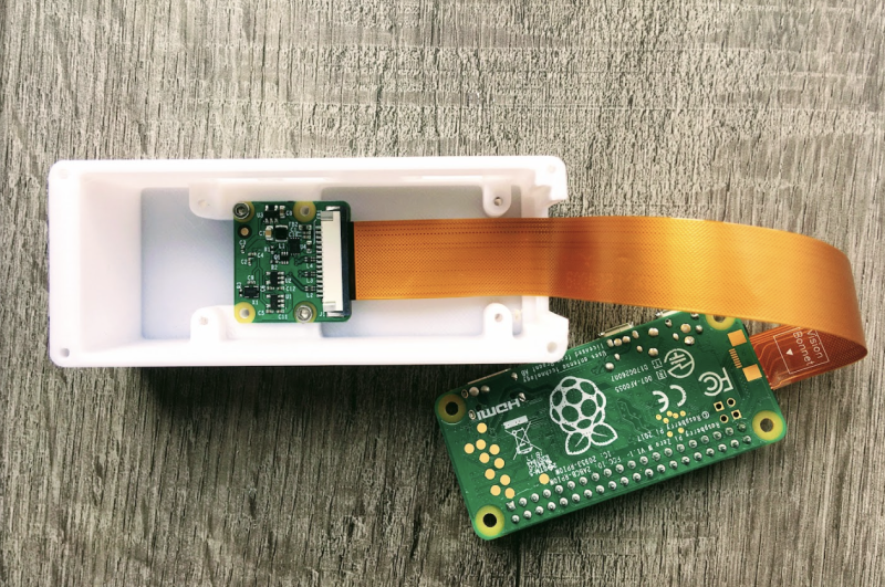 The case holds a Raspberry Pi Zero W and a Camera Module