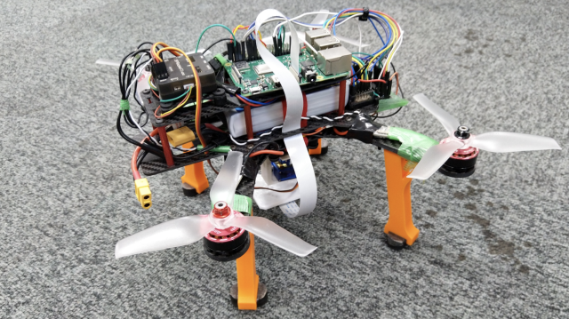 Automated camera-based drone landing system