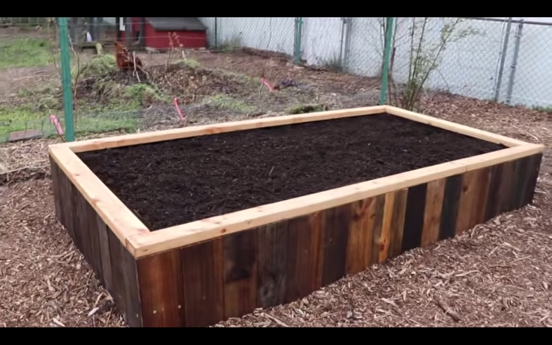 Raised beds, ponds, and even hot tubs, all built from pallets, can transform a garden