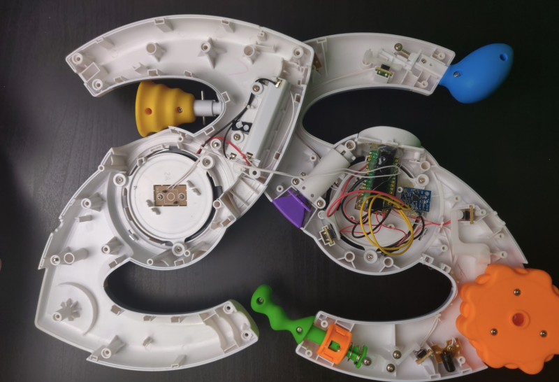 Each of the Bop It’s internal push-buttons is connected to a digital input on Pico, which is held in place using a small 3D-printed mount