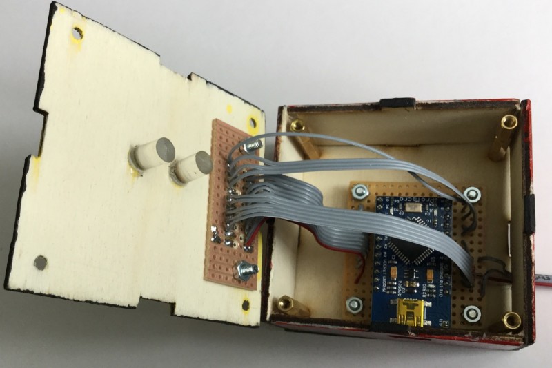 Photograph of the Arduino board and box