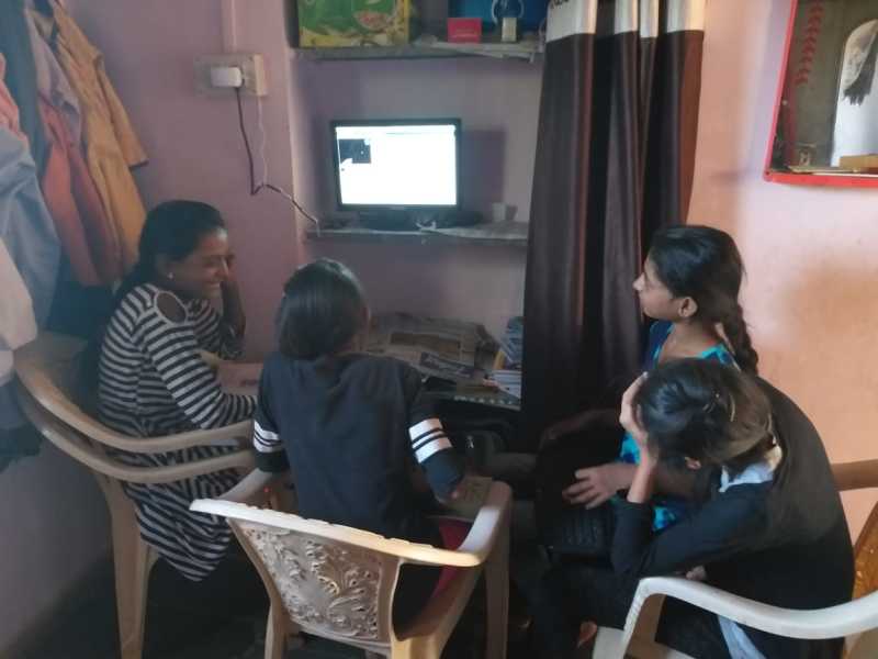A youth volunteer demonstrates her newly-acquired coding skills at Code Club India 