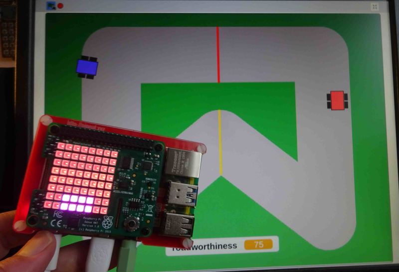 The vertical bar chart in the middle of the LED matrix is the speedometer. The tiny joystick is your accelerator. Tilt to steer!