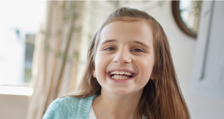 Kate, age 9, living with Rett syndrome