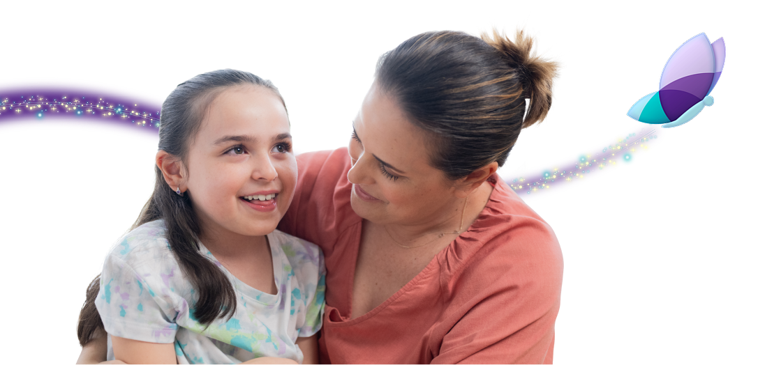 Clare, age 8, living with Rett syndrome, with her mom