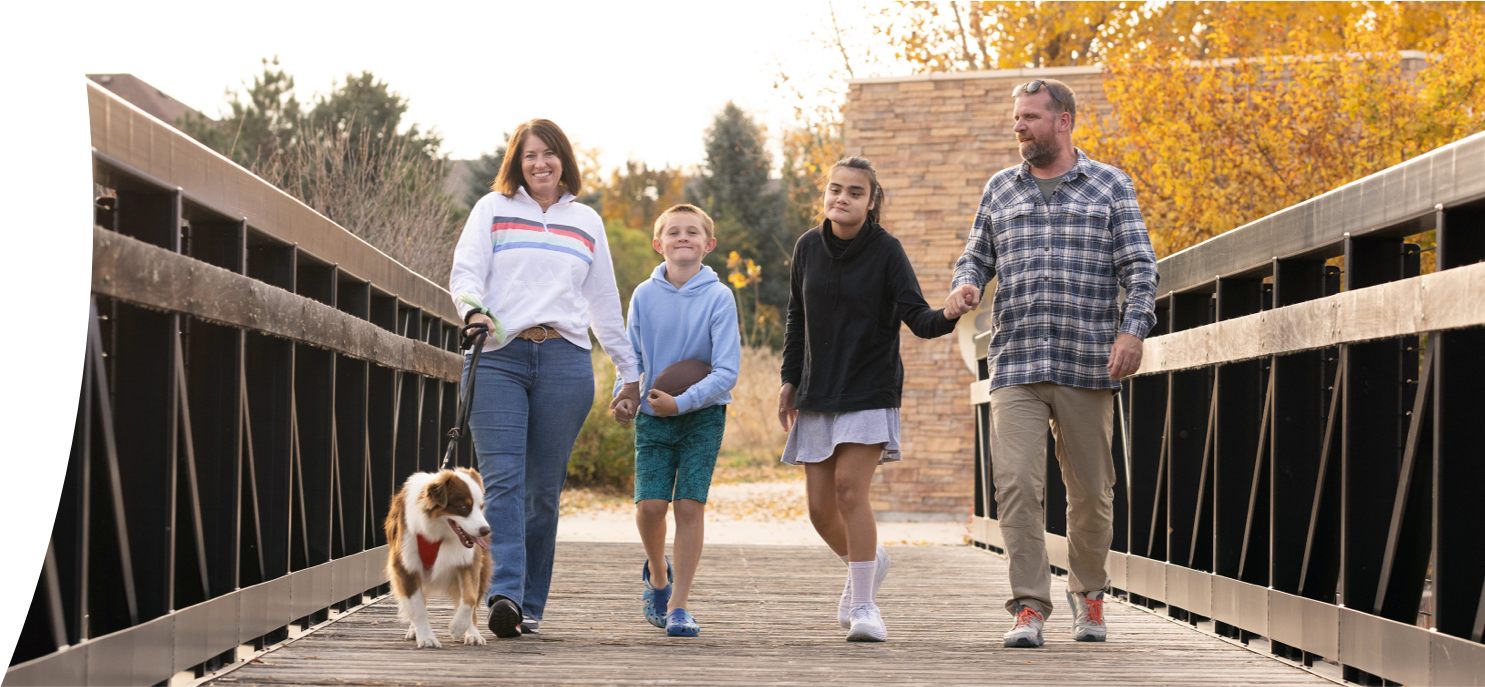 Ellie, age 15, living with Rett syndrome, with her family