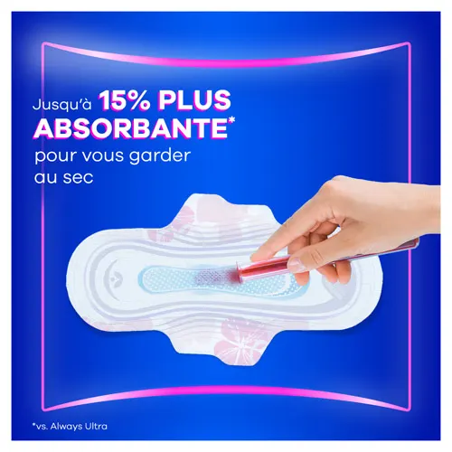 Main versant du liquide d'un tube sur la serviette et texte "Jusqu’à 15% plus absorbante".