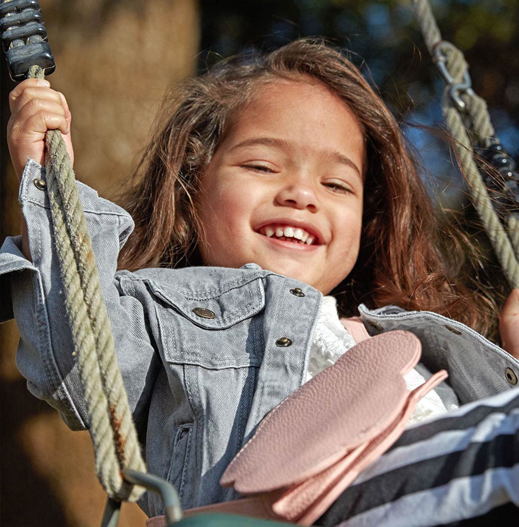 toddler on a swing