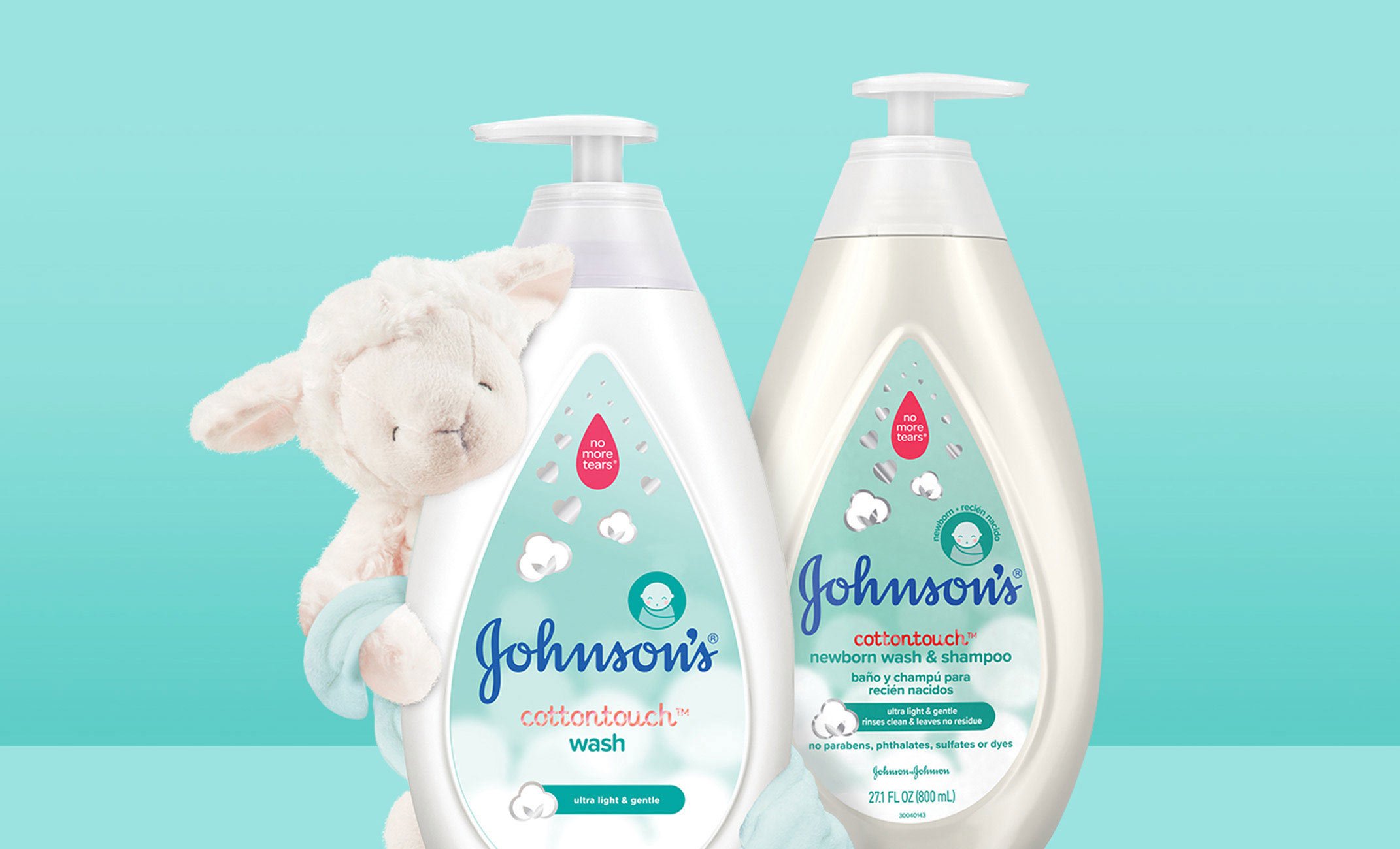 Johnson's® CottonTouch™ newborn products next to a sheep stuffed animal