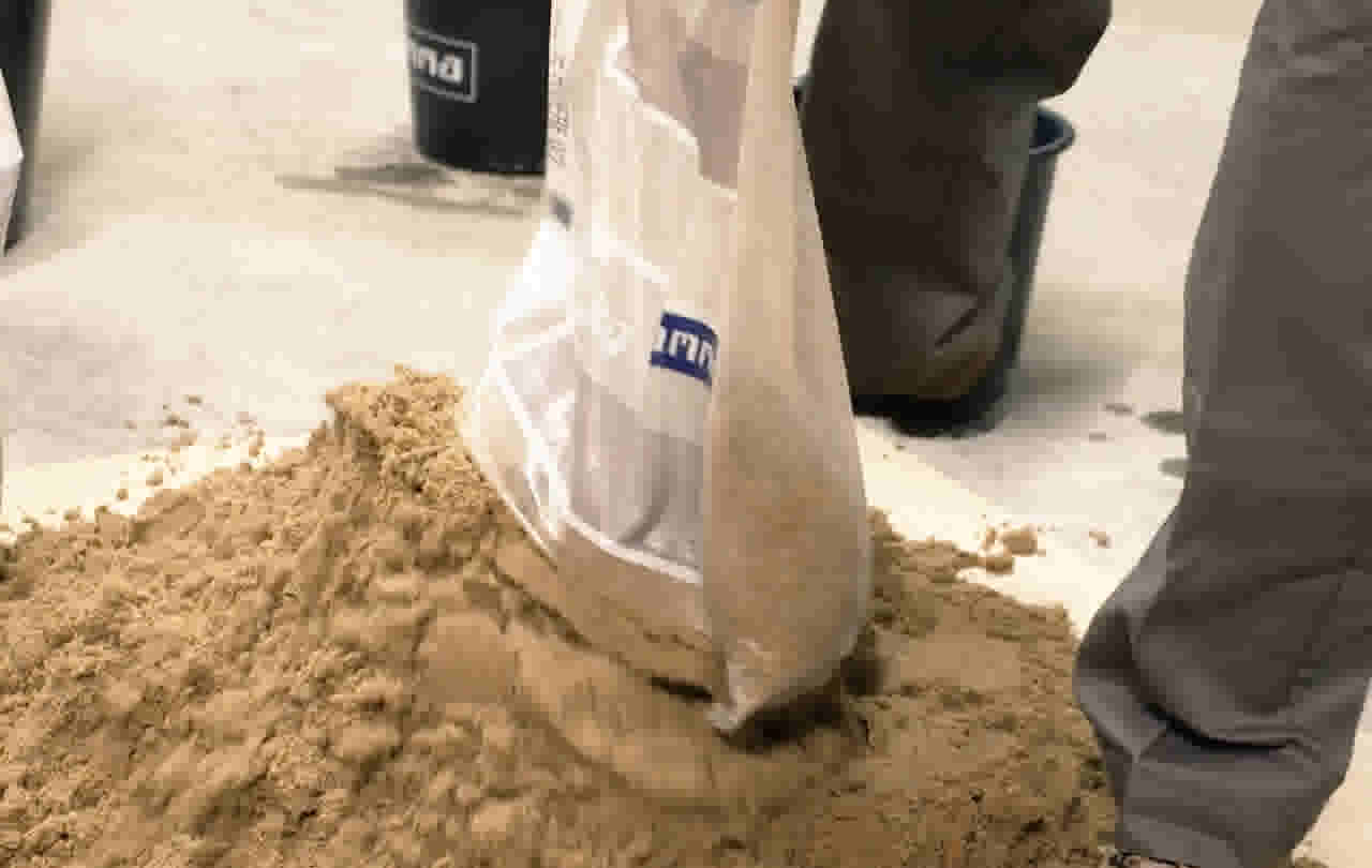 Stap 1- Strooi het zand uit