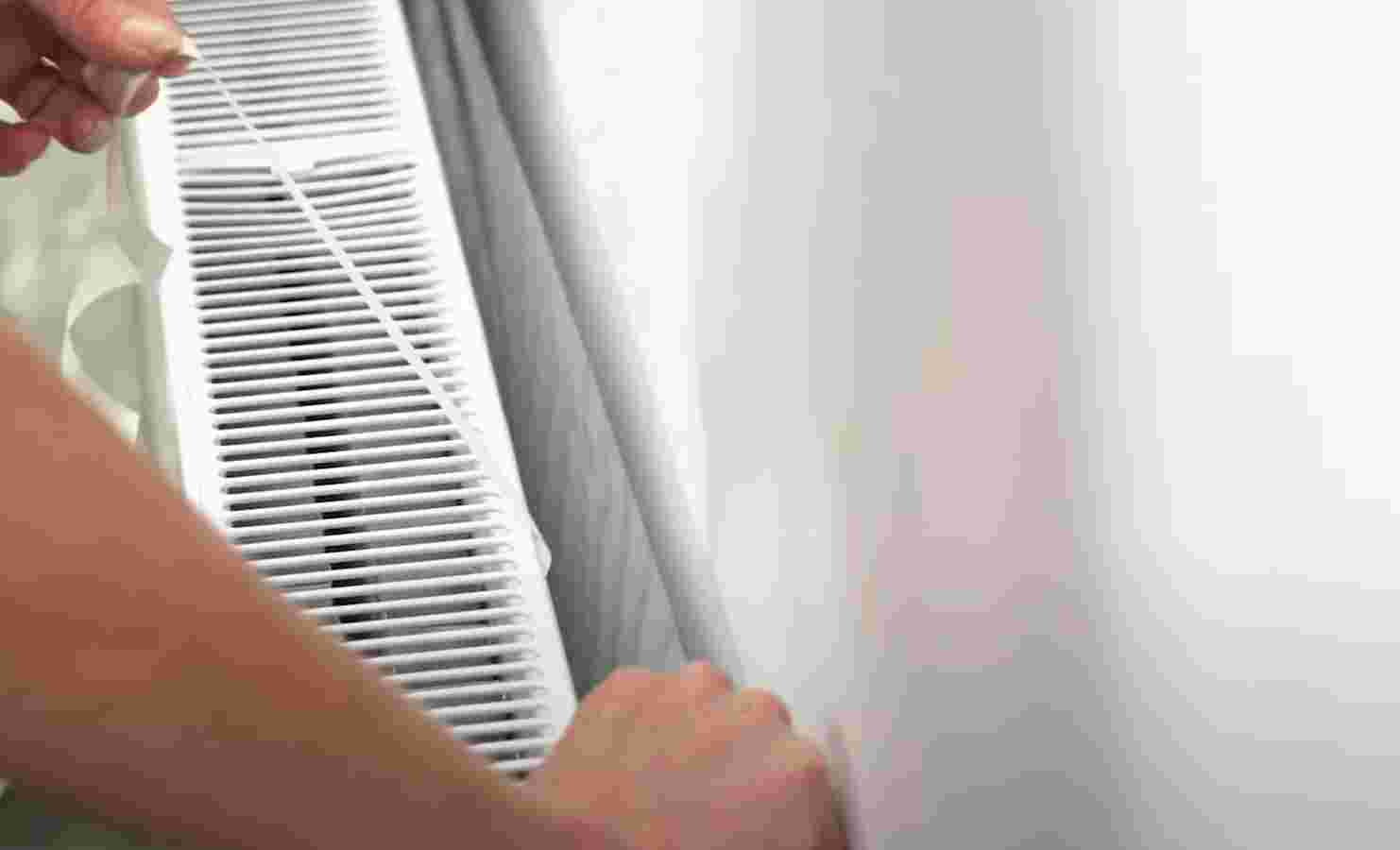 TUTO Poser un film réfléchissant derrière un radiateur 