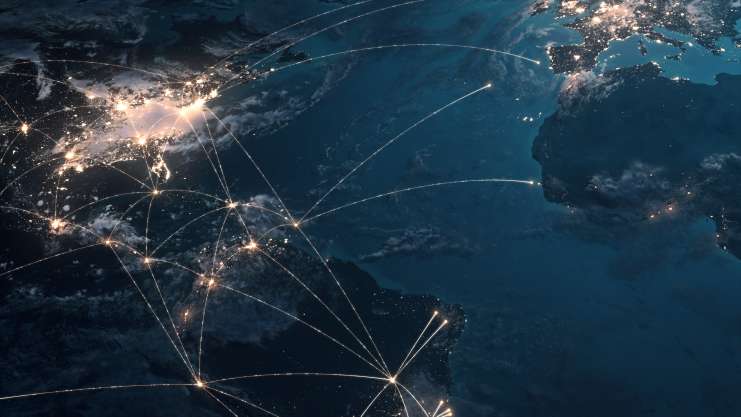 View of the Earth with connected lights to show international business.