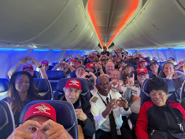 Veterans Return from Honor Flight to a Hero’s Welcome