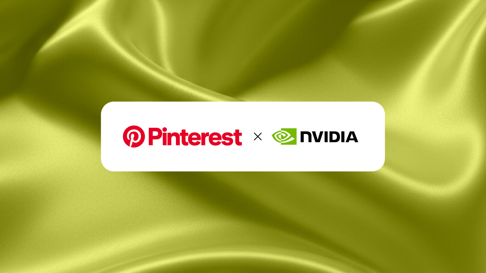 A white rectangular banner showing the red Pinterest logo and the green NVIDIA logo separated by a multiplication sign, centered on a draped, wavy olive green silk fabric background.