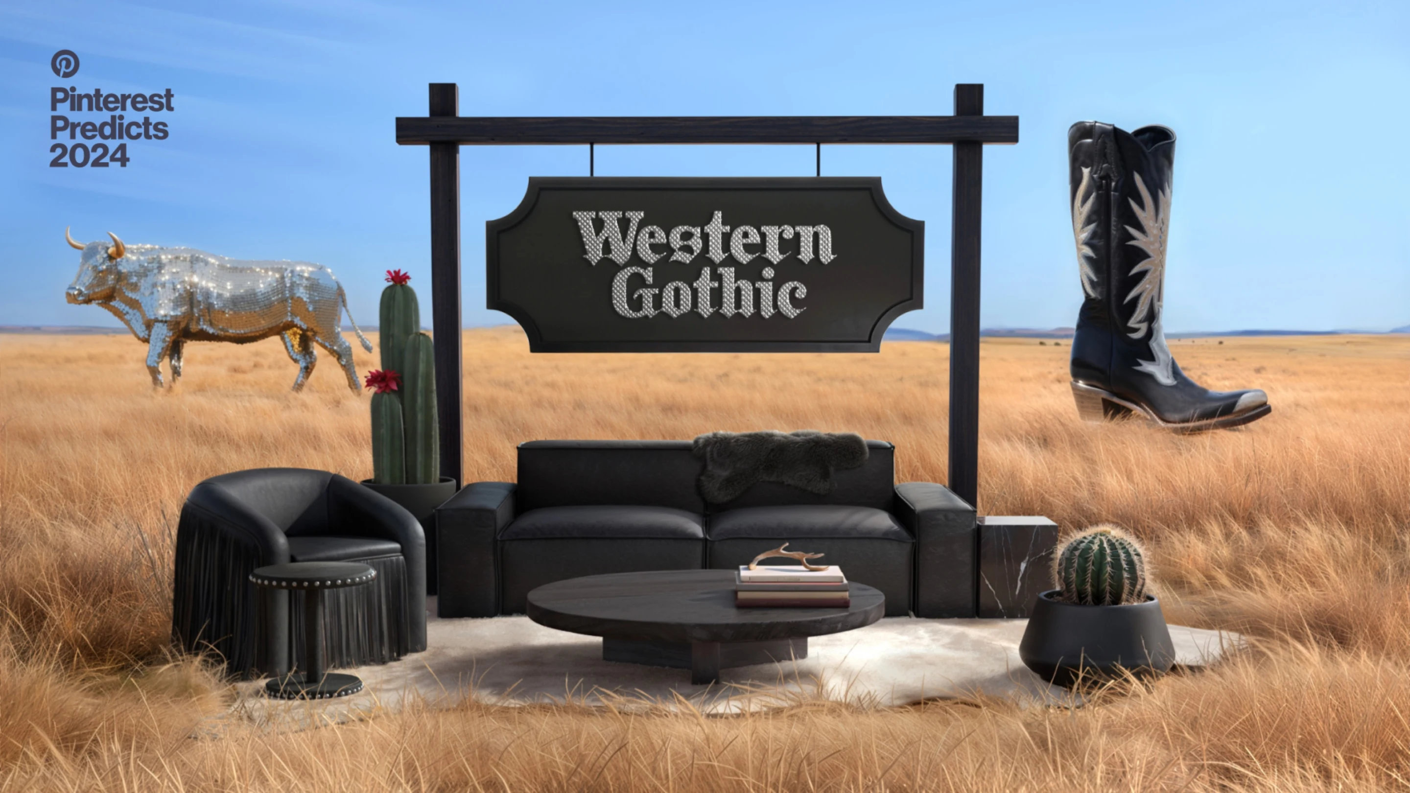 black leather couch and decor on a field with cactuses, a western-style sign, a big black country boot and a silver shimmering bull