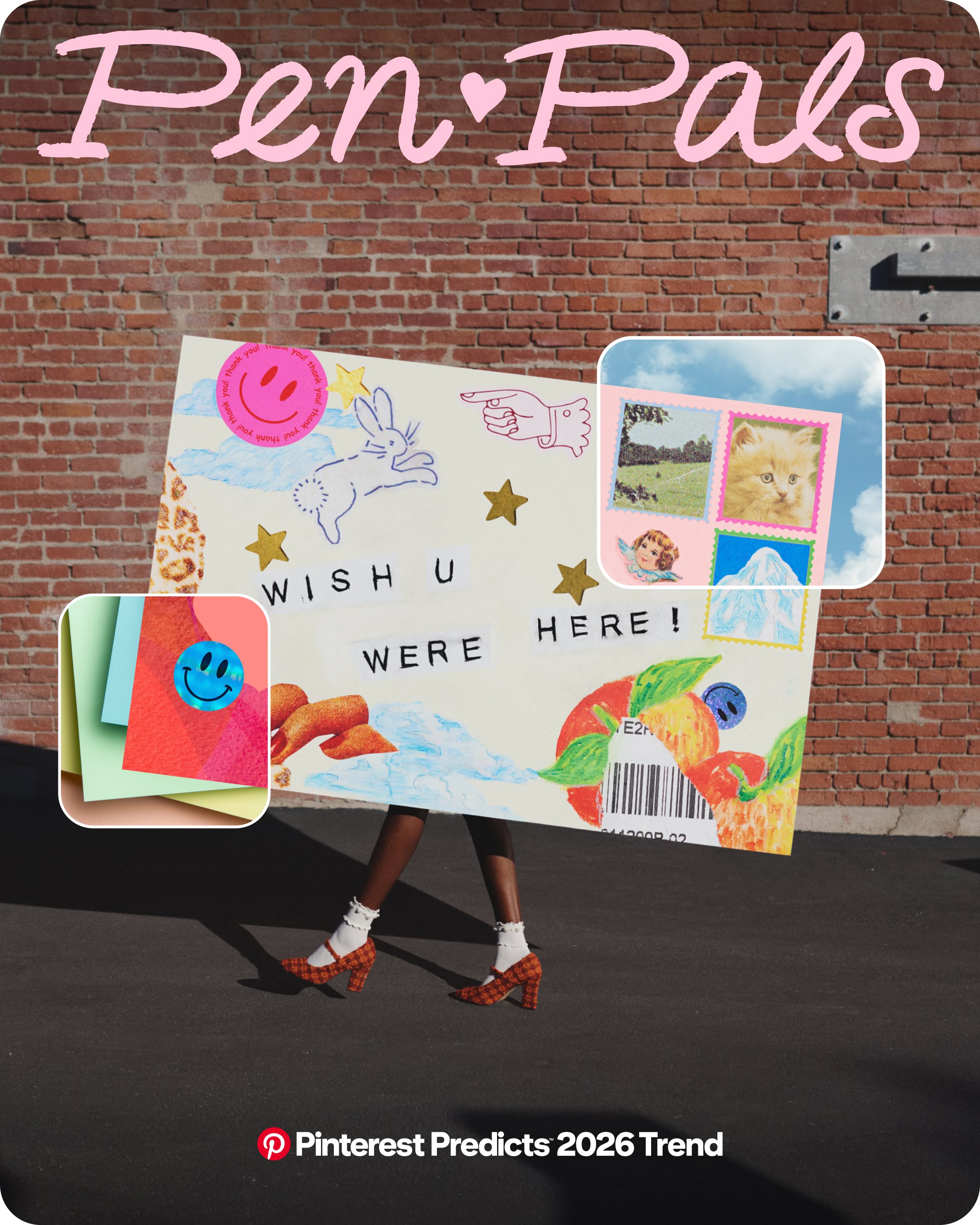 A person walks in front of a brick wall carrying a huge envelope that obscures their body. The envelope says “WISH U WERE HERE!” and is covered in stickers and stamps.