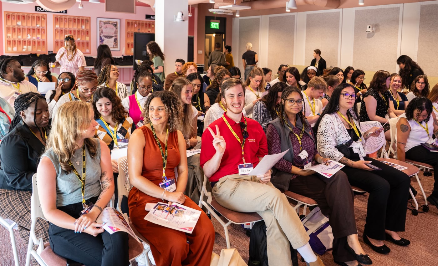A large group sits together in a Pinterest LA event space at the first Member Convening.