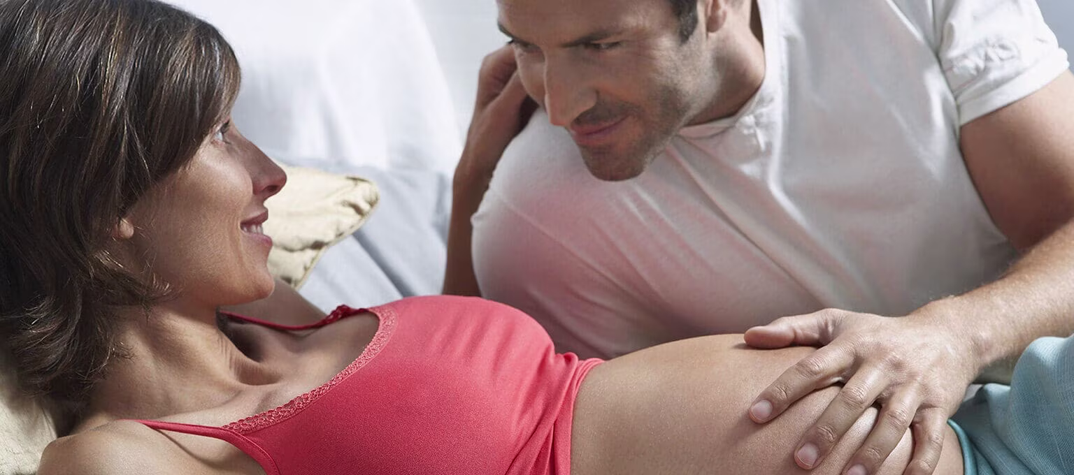 Pregnant woman and man