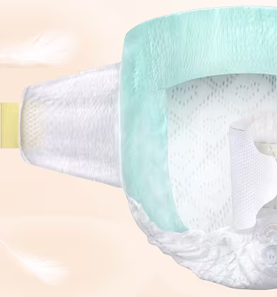 Un primer plano de un pañal Dodot muestra las diferentes capas, incluyendo la cintura elástica, el material absorbente y la suave capa exterior. Un primer plano de un pañal Dodot muestra las diferentes capas, incluyendo la cintura elástica, el material absorbente y la suave capa exterior.
