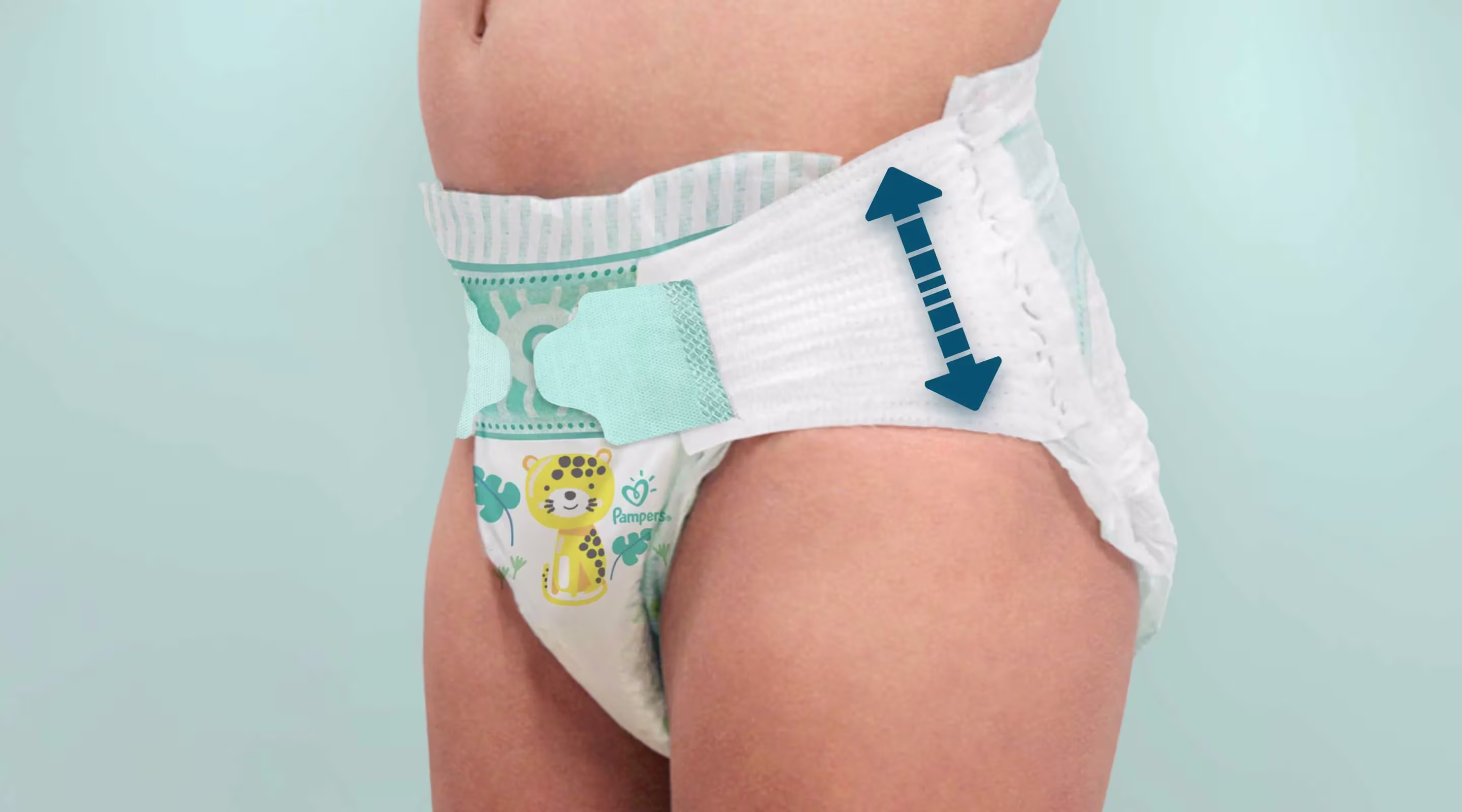 Imagem mostrando as Orelhas Elásticas Fita Flex em fralda Pampers Confort Sec.