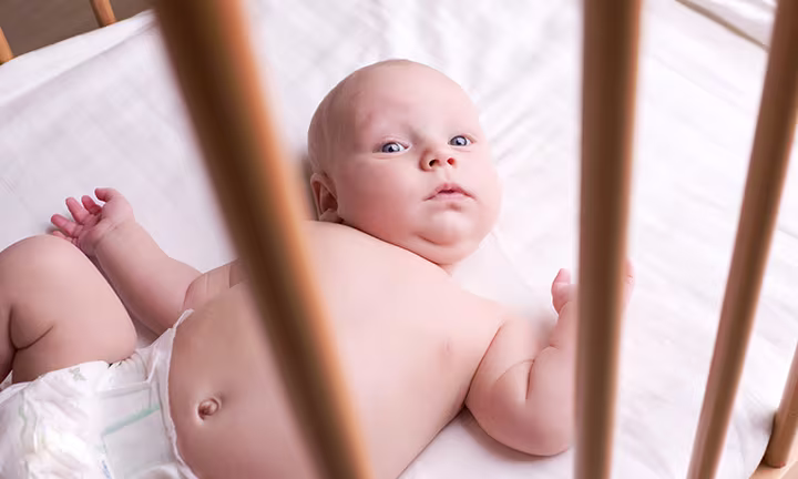 baby arching back