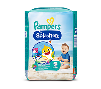 Pack of Pampers splashers on a beach with sand castle and beach toys.