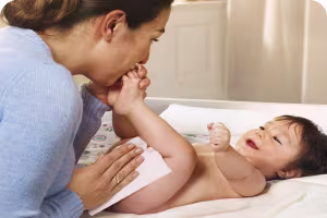 Gently cleaning baby