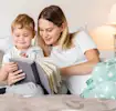 A parent reading a book with their child
