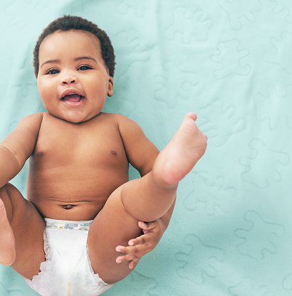 laying happy baby