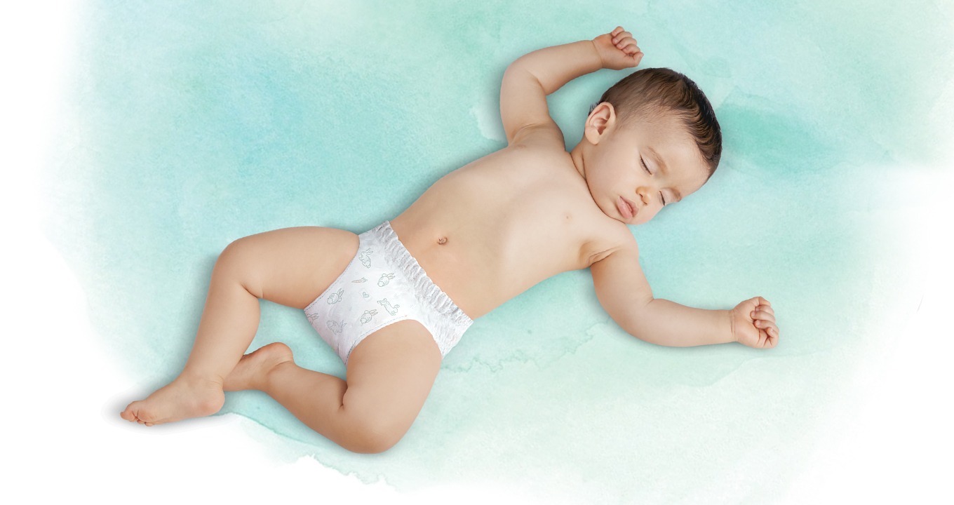 Imagine în care se vede de sus cum bebelușul doarme.