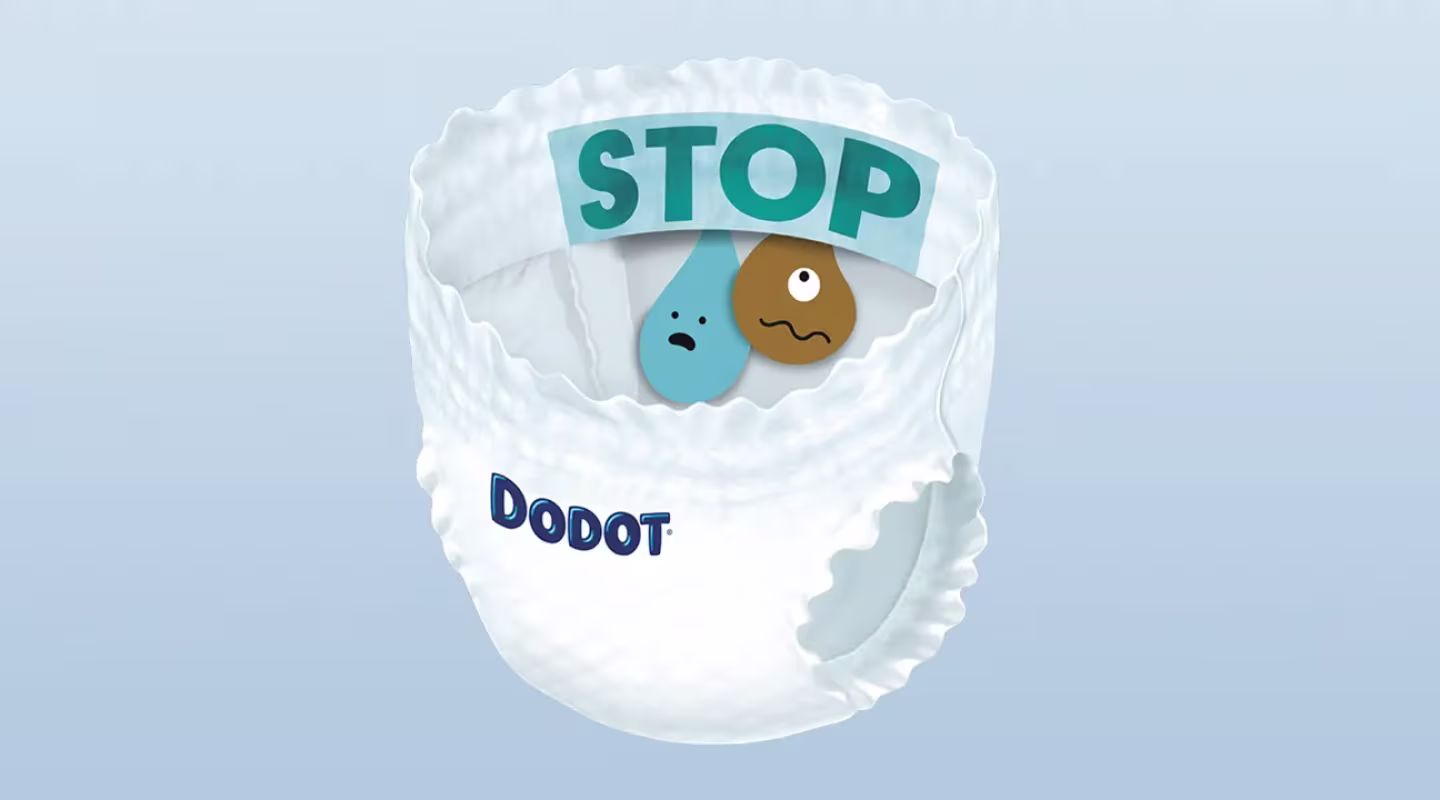 Un diseño muestra un pañal-braguita de Dodot, revelando la Barrera STOP Fugas.
