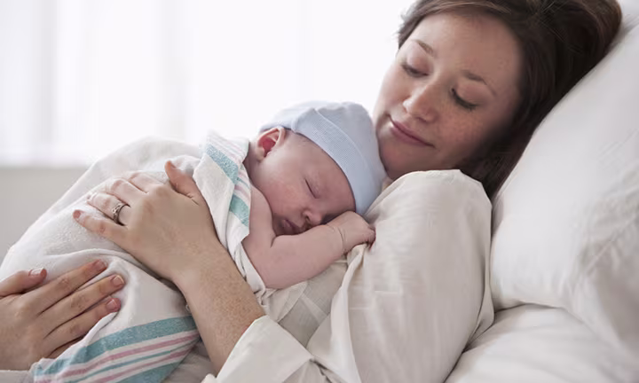 Newborn and mom after cesarean section