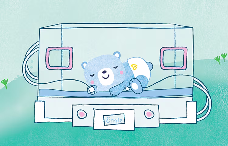 CARTOON STYLE IMAGE OF A BLUE BABY BEAR IN AN INCUBATOR WITH WIRES HOOKED TO HIS PAWS AND WEARING A DIAPER. HE IS SMILING