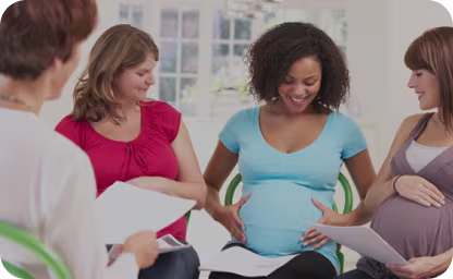 Pregnant moms sitting in circle learning about giving Birth
