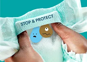 Lange Pampers Baby-Dry avec la poche Stop&Protect.