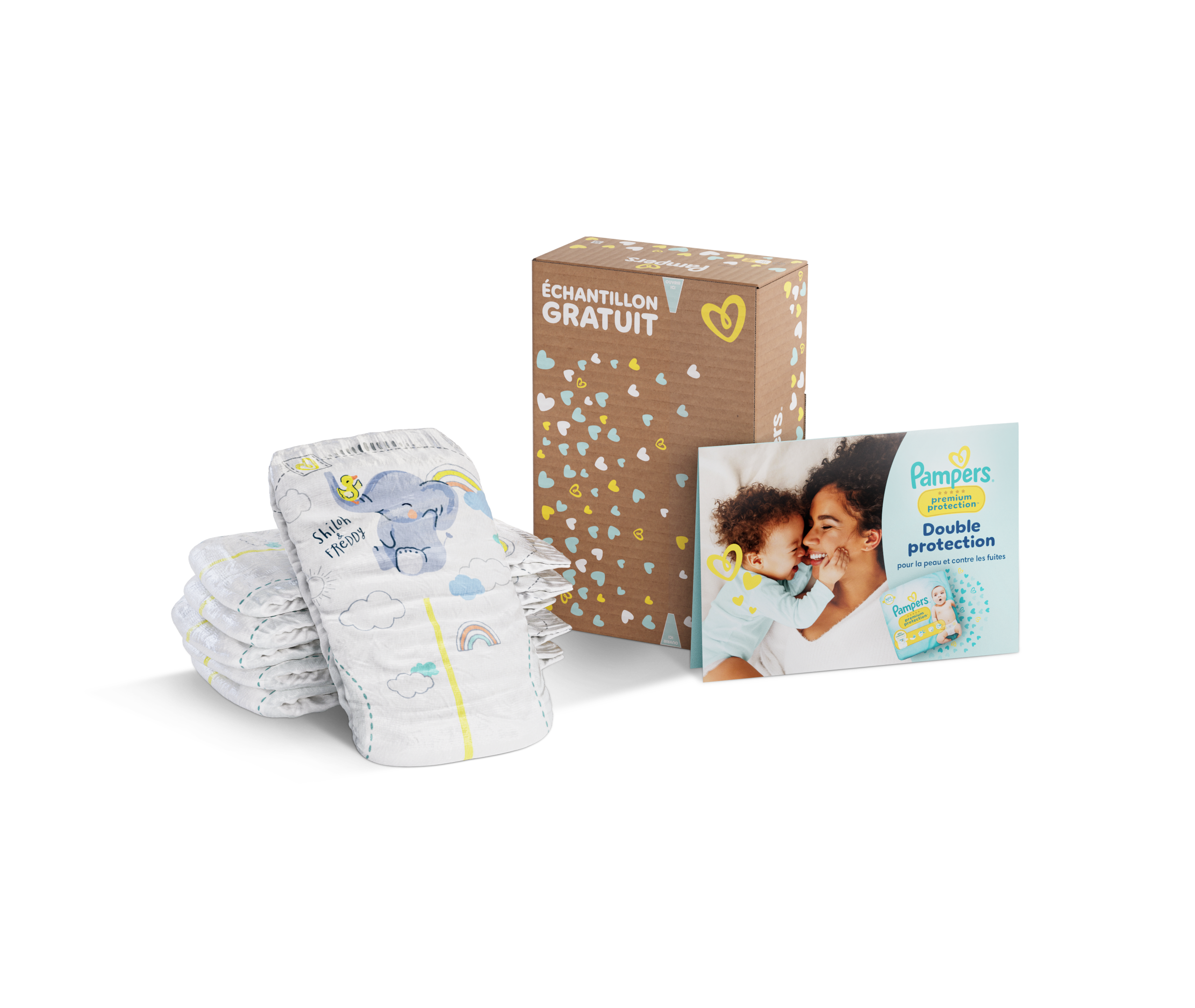 Échantillon gratuit Pampers comprenant une pile de couches pour bébé, une boîte en carton décorée de cœurs et un dépliant Pampers