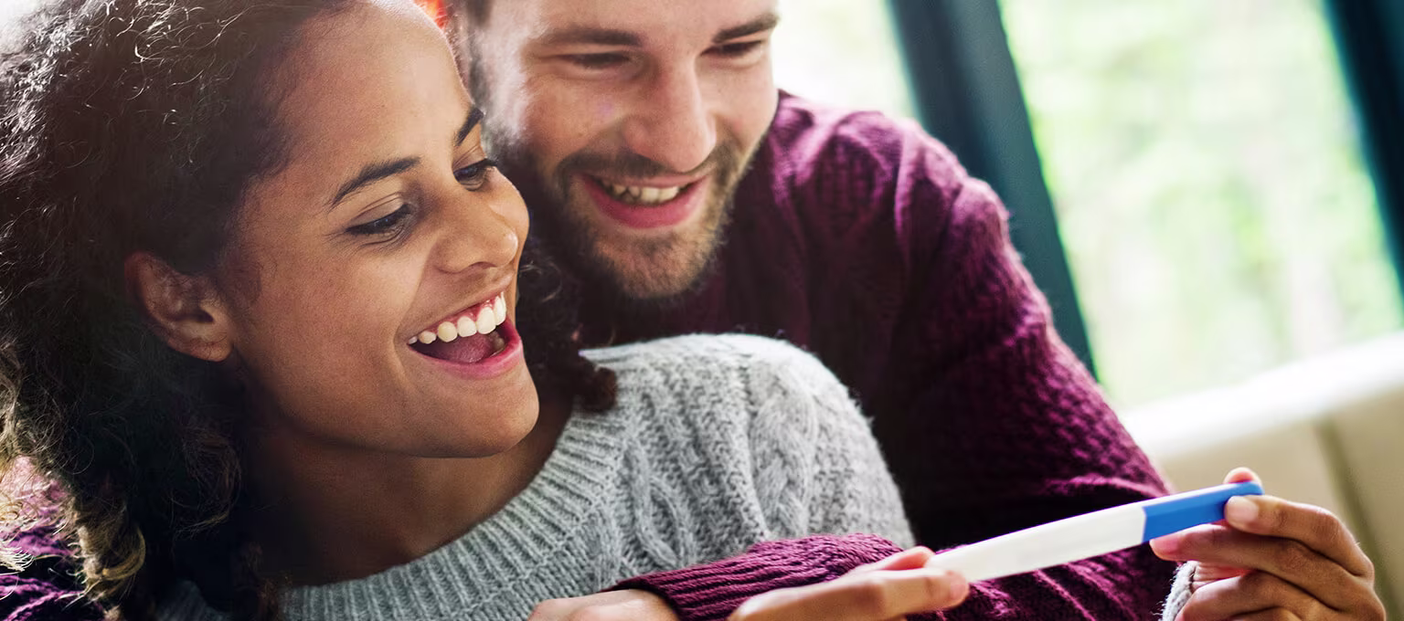 Couple getting pregnancy test result